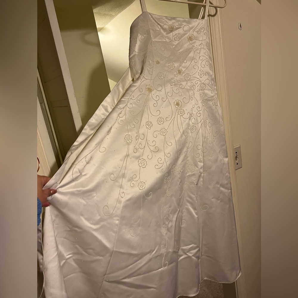 A cream colored long dress w/light beading/sequins. SZ 16